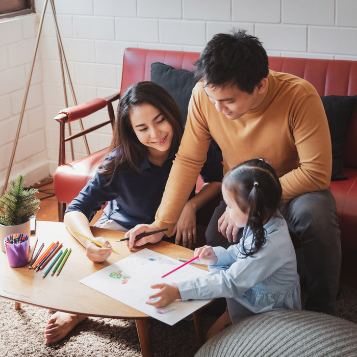 family of three coloring together